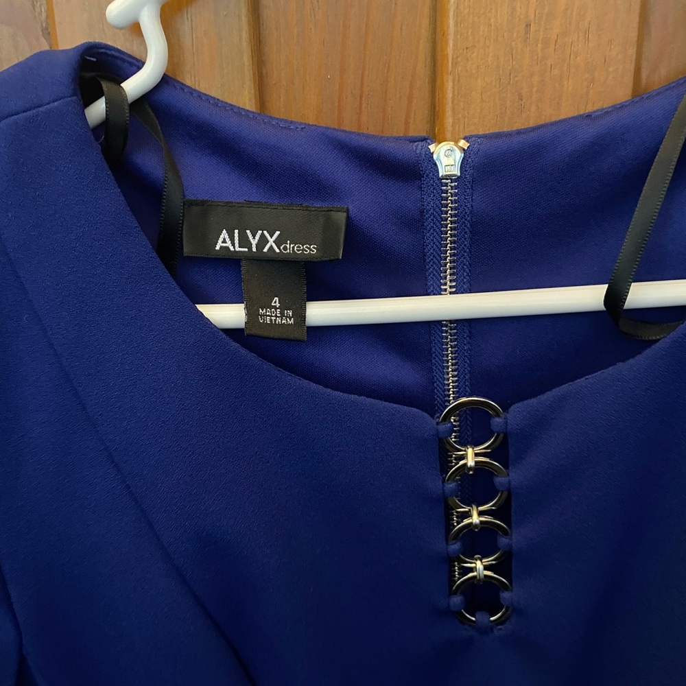 This dress came from JCPenneys. It’s dark blue and a size 4.